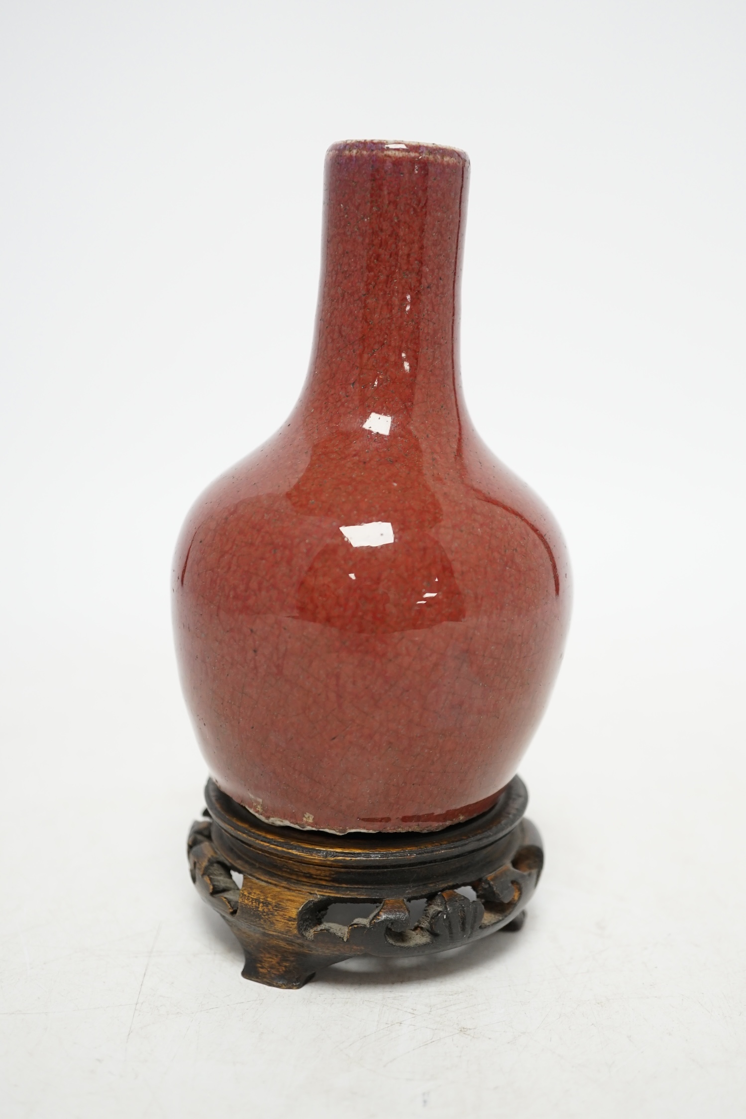 A 18th century Chinese sang de boeuf vase and associated stand, overall 16cm high. Condition - good
